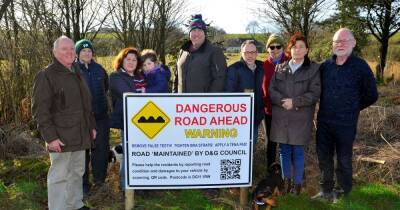 Dumfries and Galloway residents create own pothole warning sign in bid to get "reaction" from council - dailyrecord.co.uk - county Woods - county Bryan - city Springfield