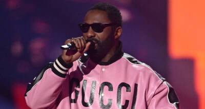Idris Elba Suffers Wardrobe Malfunction at BRIT Awards 2022 - www.justjared.com - London