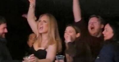 Adele shows off saucy pole dance moves and sings as she 'storms' nightclub - www.ok.co.uk - Britain