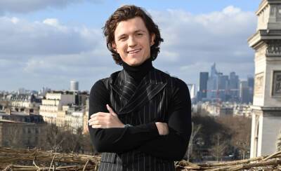 Tom Holland - Nathan Drake - Tom Holland Goes For Pinstripes in Paris on Latest 'Uncharted' Tour Stop - justjared.com - France - Madrid - city Paris, France - Rome