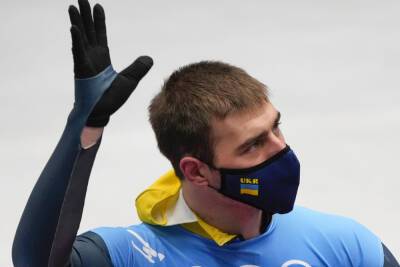Ukrainian Athlete Engages In First Political Protest At Beijing Olympics, Unfurls Sign To TV Cameras - deadline.com - Britain - China - USA - Ukraine - Russia - city Beijing
