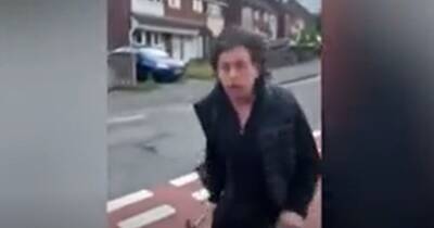 'I'll smash your f****** teeth all over the pavement and dance on your brains'- Moment thug armed with knife and hammer attacks woman in the street - www.manchestereveningnews.co.uk - Manchester