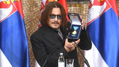 Johnny Depp Makes Rare Appearance After Losing Amber Heard Lawsuit To Receive Serbian Medal - hollywoodlife.com - Britain - Serbia