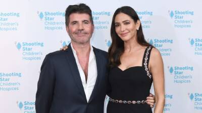 Simon Cowell Says Son Eric 'Played a Huge Part' in His Engagement to Lauren Silverman (Exclusive) - www.etonline.com - Barbados