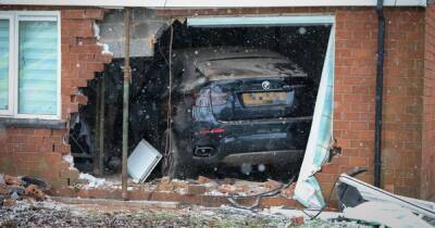 BMW driver admits driving dangerously but denies causing serious injury after crashing into 92-year-old woman's home - www.manchestereveningnews.co.uk - county Kern