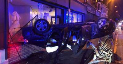 Four taken to hospital after car smashes through front window of bridal shop - www.manchestereveningnews.co.uk - Manchester - county Lane