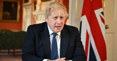 'We cannot and will not look away': Boris Johnson promises 'massive' action against Russia - www.manchestereveningnews.co.uk - Britain - Ukraine - Russia