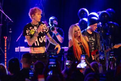 Avril Lavigne Lights Up the Roxy With Travis Barker and Machine Gun Kelly for ‘Love Sux’ Release: Concert Review - variety.com