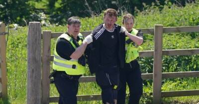 Dramatic moment murderer is arrested after stabbing ex-partner and autistic son - www.dailyrecord.co.uk - Manchester
