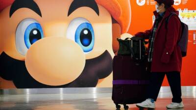 Japanese game maker Nintendo's profits hurt by chips crunch - abcnews.go.com - Japan - Tokyo