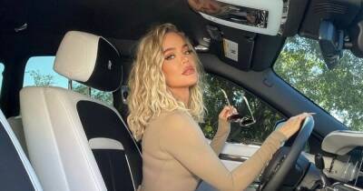 Khloe Kardashian accused of Photoshop fail as fans spot ‘real face’ in mirror - www.ok.co.uk