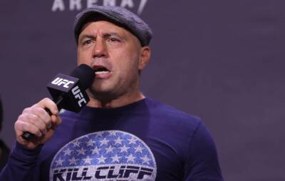 Joe Rogan apologises for racist slurs as Spotify removes 70 episodes of his podcast - www.nme.com - India