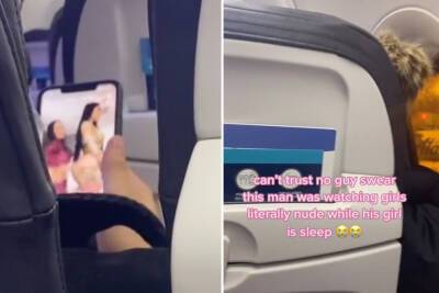 Plane passenger busts man ‘watching porn’ while girlfriend sleeps: ‘trust no guy’ - nypost.com - city Sandy