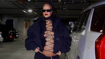Rihanna Bares Baby Bump in Lace-Up Top Paired With Sky-High Stilettos - www.etonline.com - California - New York - city Harlem, state New York