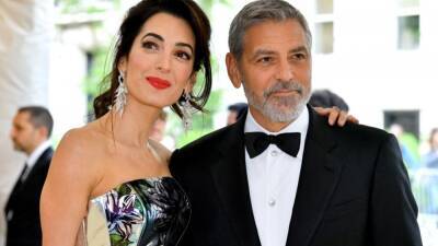 George Clooney - Amal Clooney - Trevor Noah - Amal Clooneyfoundation - George Clooneyfoundation - Watch George Clooney and Wife Amal Accept Elevate Prize Foundation's Catalyst Award Together - etonline.com
