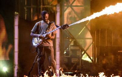 Watch Dave perform ‘In the Fire’ at the BRIT Awards 2022 with a guitar-flamethrower - www.nme.com