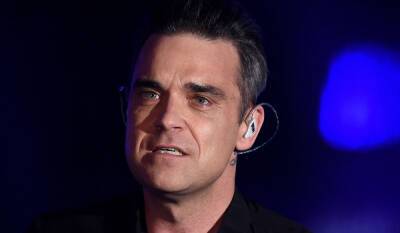 Robbie Williams says Shane Warne's sudden death has left him 'terrified' - hellomagazine.com
