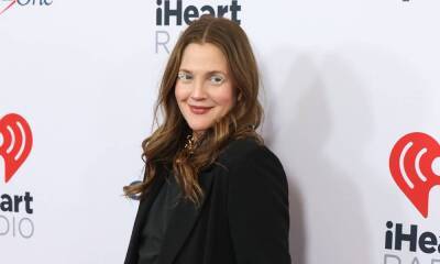 Drew Barrymore sparks reaction with cheeky dance from her bathroom - hellomagazine.com - Britain