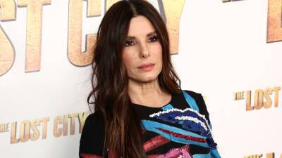 Sandra Bullock Jokes Her Purple Sequin Jumpsuit Is the ‘Real Star’ of ‘The Lost City’ (Exclusive) - www.etonline.com - New York - city Lost - county Bullock