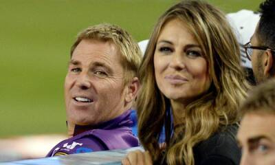 Elizabeth Hurley reacts as Shane Warne’s ex-wife is comforted by children in new photo - hellomagazine.com - Australia