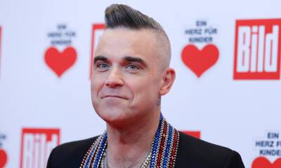 Robbie Williams reveals fears for his children with wife Ayda - hellomagazine.com