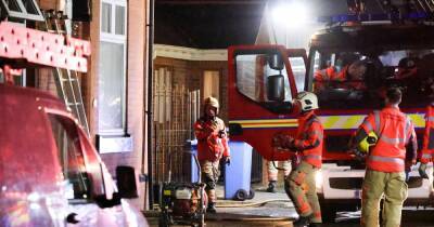 Eight fire engines rush to blaze in roof of terrace house in Ashton - www.manchestereveningnews.co.uk - Manchester