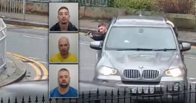 Dramatic footage shows gun-toting thug open fire in BMW drive-by shooting - catching innocent bystander in crossfire - www.manchestereveningnews.co.uk - Manchester - county Newton