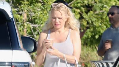Pamela Anderson, 54, Stuns In White Dress Knee High Boots After Divorce From Fifth Husband - hollywoodlife.com - California - Canada - county Rock