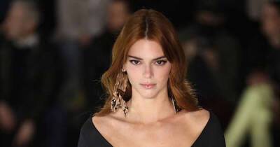 Kendall Jenner takes the plunge in a deep V-neck black gown - www.msn.com - Britain - France