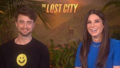 'The Lost City's Sandra Bullock & Daniel Radcliffe Dish on Channing Tatum & Brad Pitt's Epic Wigs (Exclusive) - www.etonline.com - city Lost - county Bullock