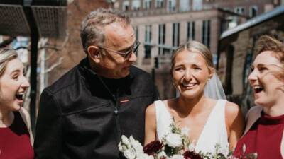 Tom Hanks Pulls a Bill Murray, Photobombs Unsuspecting Bride on Her Wedding Day - thewrap.com