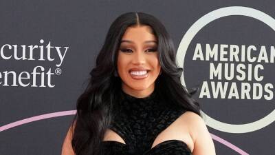 Cardi B's Latest Hairstyle Is So Pam Anderson - www.glamour.com