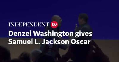 Denzel Washington giving Samuel L Jackson honorary Oscar is most wholesome thing you'll see today - www.msn.com - New York - Ukraine - Washington