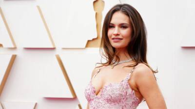 Lily James - Tommy Lee - Lily James' Sheer Oscars Dress Is All Leg - glamour.com