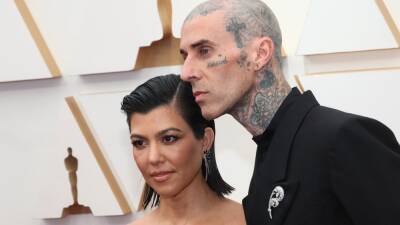 Of Course Kourtney Kardashian and Travis Barker Are Wearing All Black at the Oscars - www.glamour.com