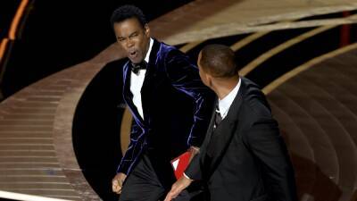 Will Smith Punches Chris Rock on Oscar Stage After Jada Joke: ‘Keep My Wife’s Name Out Your F—ing Mouth’ - thewrap.com