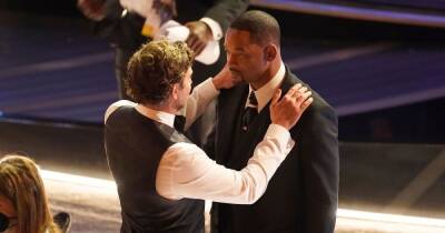 Oscars 2022: Will Smith ‘calmed down’ by Bradley Cooper after hitting Chris Rock on stage - www.ok.co.uk - USA - Washington - Smith