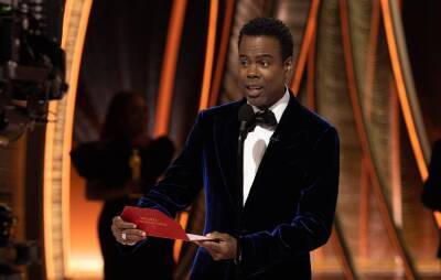 New video emerges of Chris Rock looking stunned in moments after Will Smith slapped him - www.nme.com