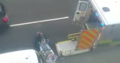 Bloody footage shows Uddingston machete attack victim stretchered into ambulance - www.dailyrecord.co.uk - Scotland