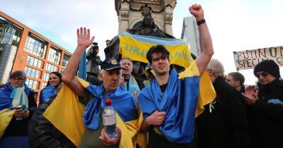 Emotional moment Ukrainian man completes 45-mile run for family back home as protesters cheer in Piccadilly Gardens - www.manchestereveningnews.co.uk - Centre - Manchester - Ukraine - county Garden