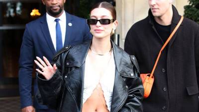 Hailey Baldwin Rocks Open Sweater Flared Jeans At Paris Fashion Week — Photos - hollywoodlife.com