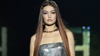 Gigi Hadid Pledges to Donate Earnings from 2022 Fashion Shows to The Ukraine - www.etonline.com - Ukraine - county Hand - Palestine - Beyond
