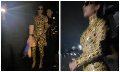 Kim Kardashian covers her curves in yellow tape at Balenciaga fashion show - us.hola.com - Ukraine