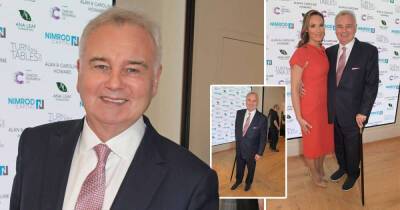 Eamonn Holmes poses with walking stick after revealing chronic back pain battle - www.msn.com - Britain - London