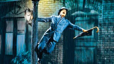 Gene Kelly Shares Backstory of 'Singin' in the Rain' Number That Broke Hollywood's Musical Clichés (Flashback) - www.etonline.com