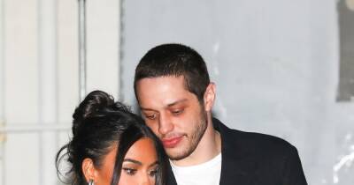Kim Kardashian and Pete Davidson can't keep their hands off each other in new snap - www.wonderwall.com