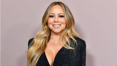 Mariah Carey Wears Full Evening Gown in the Pool During Celebratory Instagram Live - www.etonline.com - Ireland - county Cannon - county Monroe