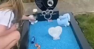 Shocking video shows girls laughing as they mess with child's grave - www.manchestereveningnews.co.uk - Manchester