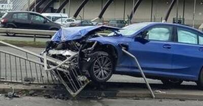 BMW driver smashes into barrier near Trafford Centre - www.manchestereveningnews.co.uk - Manchester