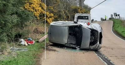 Motor flips over after smashing into pole on Scots country road with driver reported to prosecutors - www.dailyrecord.co.uk - Scotland